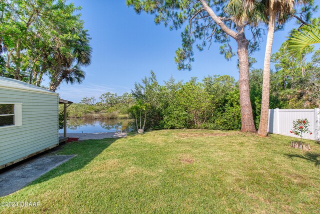 view of yard with a water view