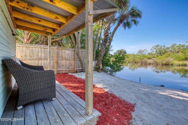 deck featuring a water view