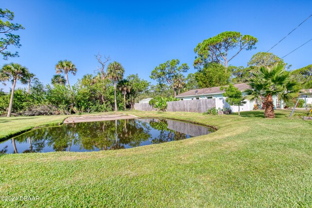 view of yard with a water view