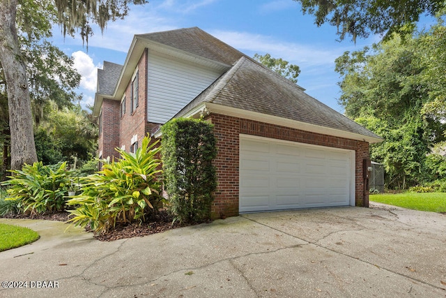 view of home's exterior featuring a garage