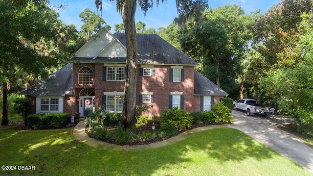 view of front of house with a front lawn