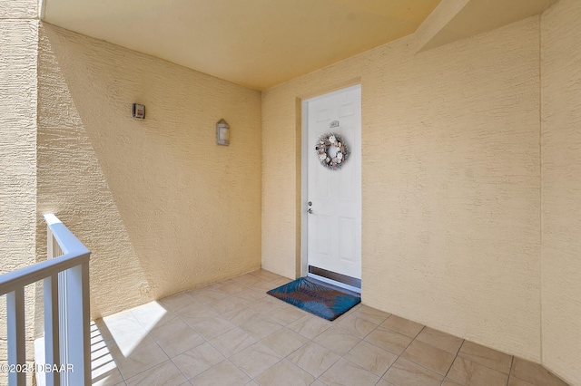 3343 S Atlantic Ave Unit 601, Daytona Beach Shores, FL 32118 - property entrance featuring stucco siding and a balcony