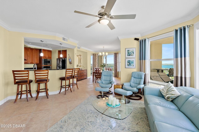 3343 S Atlantic Ave Unit 601, Daytona Beach Shores, FL 32118 - living area featuring a chandelier, crown molding, a ceiling fan, and light tile patterned floors