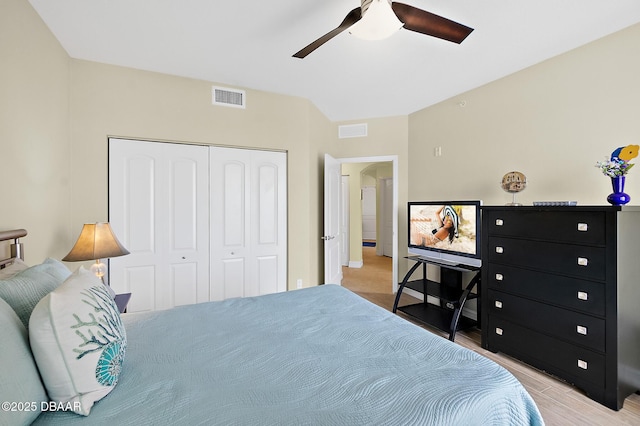 3343 S Atlantic Ave Unit 601, Daytona Beach Shores, FL 32118 - bedroom featuring a closet, light wood finished floors, and ceiling fan