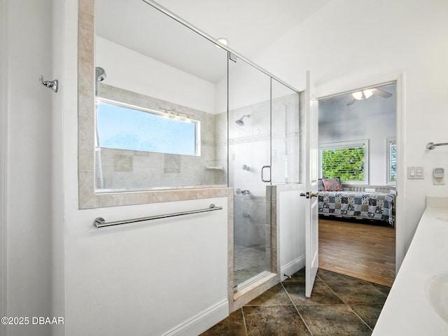 206 S Riverside Dr, Edgewater, FL 32132 - full bathroom featuring ensuite bathroom, a shower stall, double vanity, and plenty of natural light
