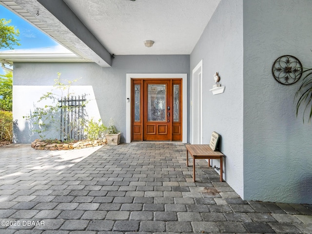 206 S Riverside Dr, Edgewater, FL 32132 - doorway to property with stucco siding