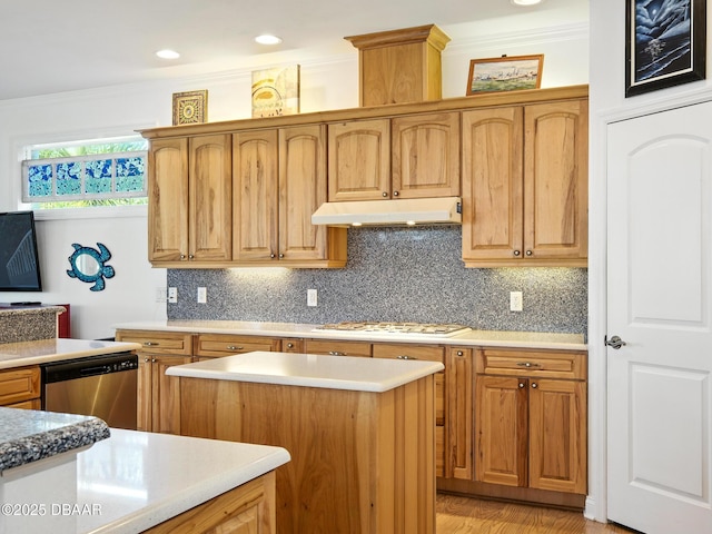 206 S Riverside Dr, Edgewater, FL 32132 - kitchen featuring under cabinet range hood, white gas stovetop, dishwasher, ornamental molding, and backsplash