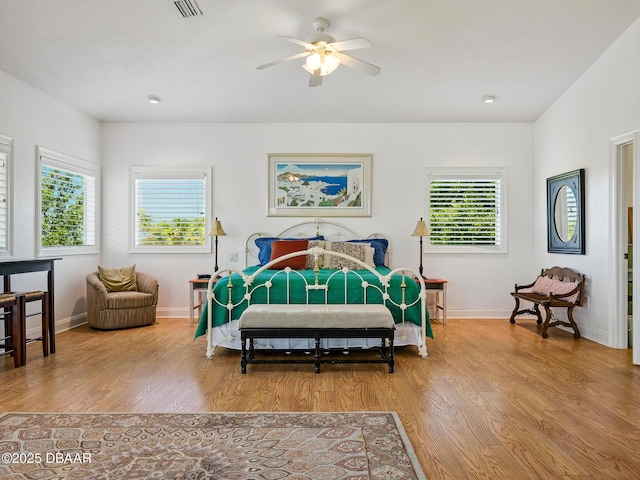 206 S Riverside Dr, Edgewater, FL 32132 - bedroom featuring wood finished floors and a ceiling fan