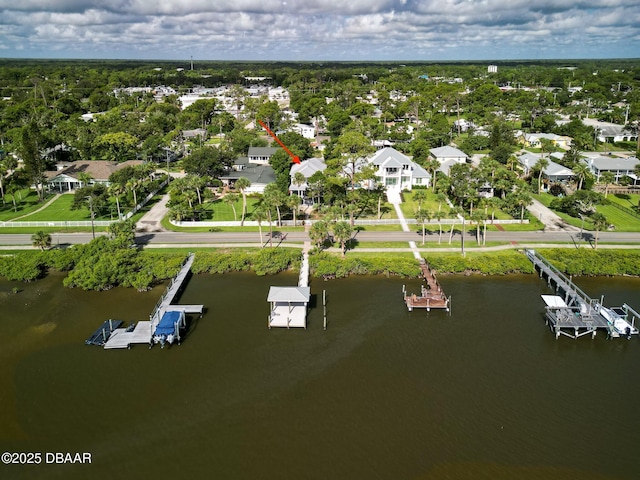 206 S Riverside Dr, Edgewater, FL 32132 - aerial view of property and surrounding area featuring a large body of water and nearby suburban area