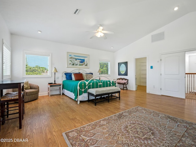 206 S Riverside Dr, Edgewater, FL 32132 - bedroom with vaulted ceiling, wood finished floors, recessed lighting, and a ceiling fan