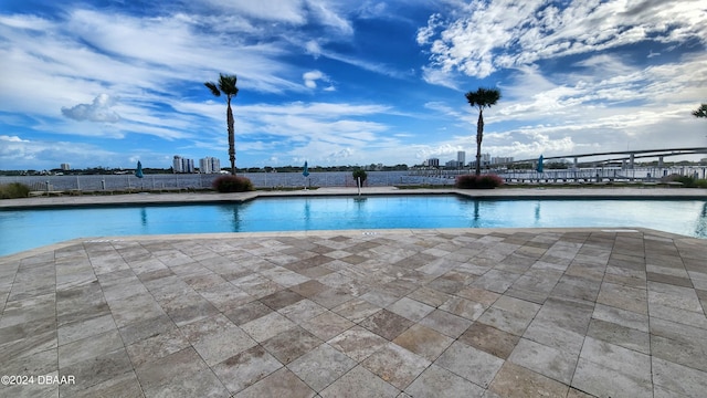 view of swimming pool featuring a patio