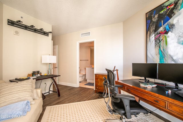 office area with dark hardwood / wood-style flooring