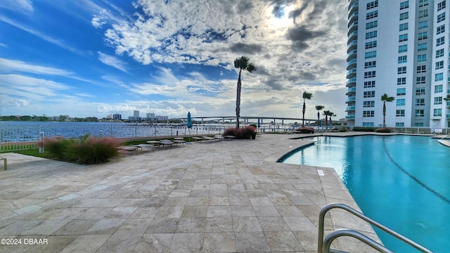 view of pool featuring a patio area