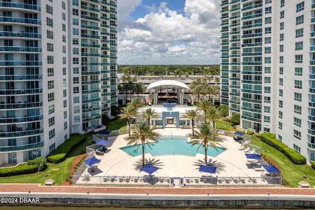 view of swimming pool with a patio