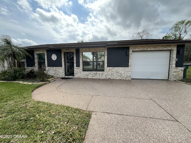 view of front facade with an attached garage, stone siding, and driveway