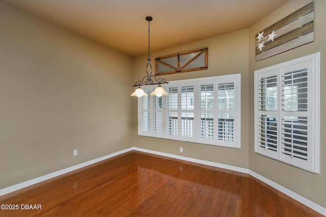 6065 Spruce Point Cir, Port Orange, FL 32128 - unfurnished dining area featuring wood finished floors and healthy amount of natural light
