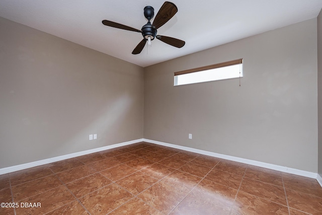 6065 Spruce Point Cir, Port Orange, FL 32128 - empty room with a ceiling fan and baseboards