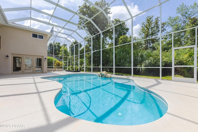 6065 Spruce Point Cir, Port Orange, FL 32128 - outdoor pool with a patio, french doors, and a lanai