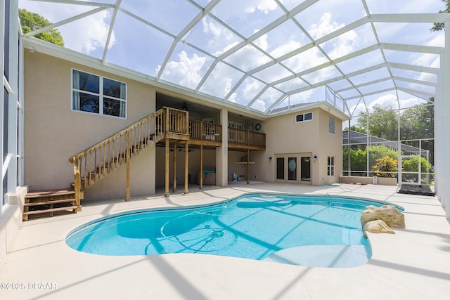 6065 Spruce Point Cir, Port Orange, FL 32128 - outdoor pool featuring stairs, a ceiling fan, a patio, french doors, and a lanai