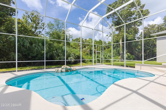 6065 Spruce Point Cir, Port Orange, FL 32128 - swimming pool with a lanai, a patio, and view of scattered trees