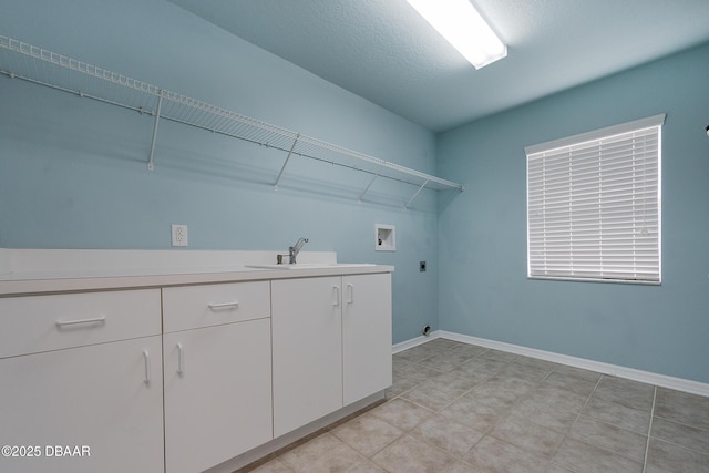 6065 Spruce Point Cir, Port Orange, FL 32128 - laundry room with electric dryer hookup, hookup for a washing machine, and cabinet space