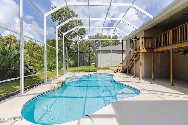 6065 Spruce Point Cir, Port Orange, FL 32128 - swimming pool featuring a patio, stairway, and a lanai