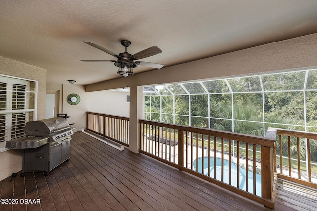 6065 Spruce Point Cir, Port Orange, FL 32128 - wooden deck with a grill, an outdoor pool, and a ceiling fan