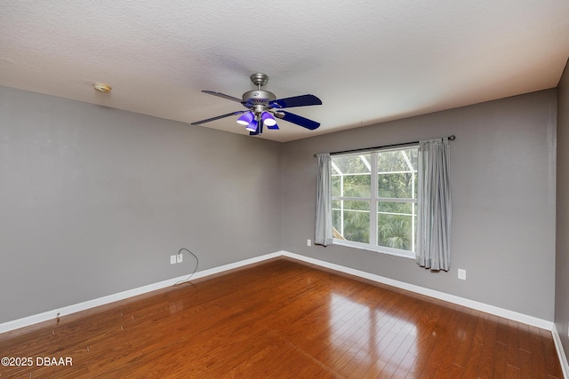 6065 Spruce Point Cir, Port Orange, FL 32128 - empty room with ceiling fan, wood finished floors, and a smoke detector