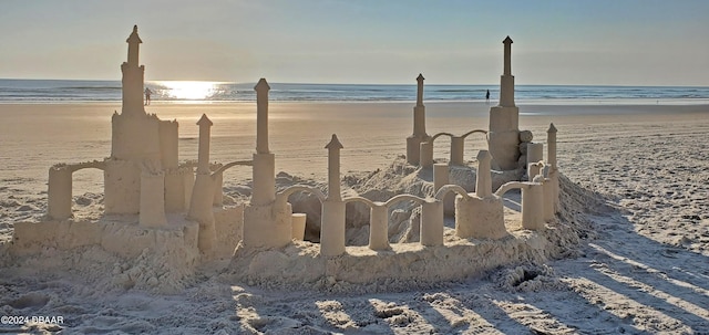 view of water feature with a beach view