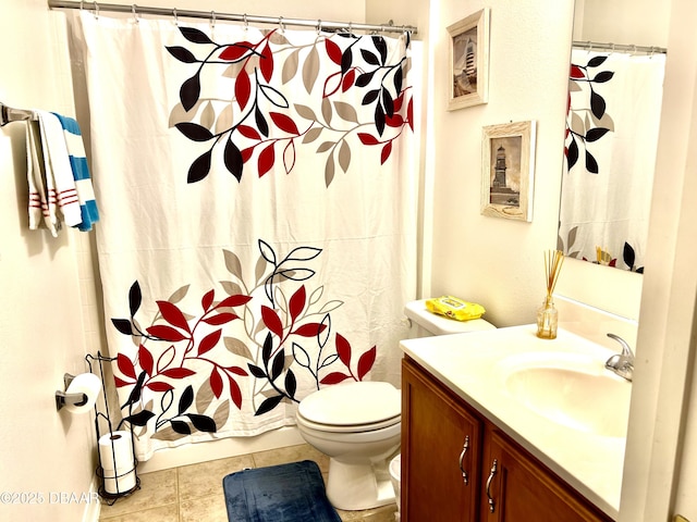 bathroom with toilet, a shower with curtain, tile patterned flooring, and vanity