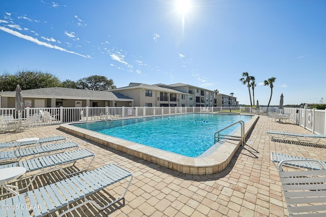 view of pool featuring a patio