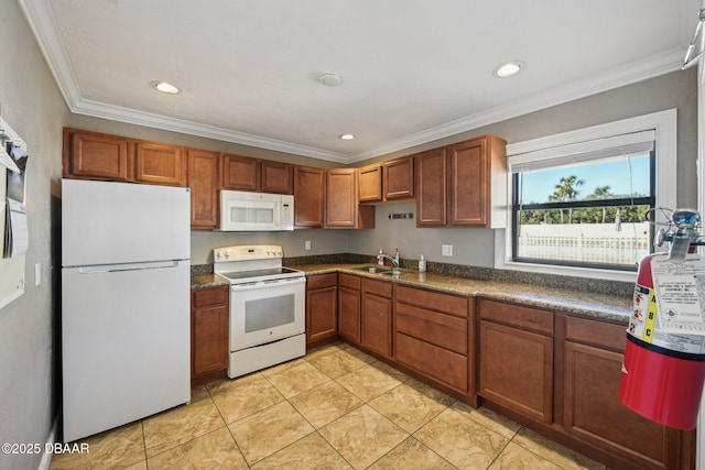 kitchen featuring ornamental molding, sink, light tile patterned flooring, and white appliances