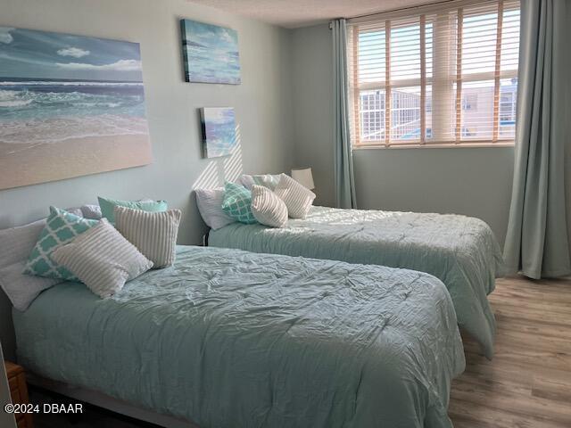 bedroom featuring hardwood / wood-style flooring