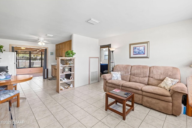 1 Beechwood Dr, Ormond Beach, FL 32176 - living room featuring a ceiling fan and light tile patterned floors