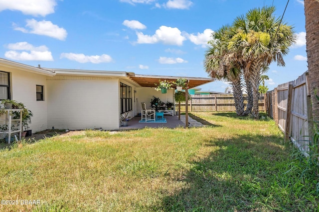 1 Beechwood Dr, Ormond Beach, FL 32176 - fenced backyard with a patio area