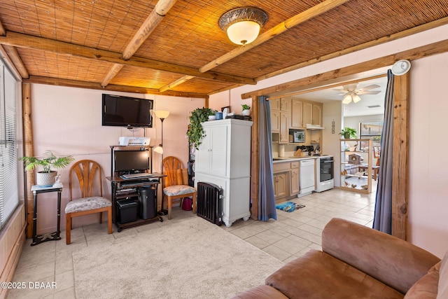 1 Beechwood Dr, Ormond Beach, FL 32176 - living area featuring light tile patterned floors, a wood ceiling with exposed beams, ceiling fan, and radiator heating unit