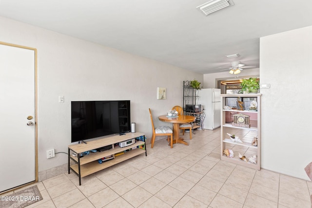 1 Beechwood Dr, Ormond Beach, FL 32176 - living room featuring a ceiling fan and light tile patterned floors