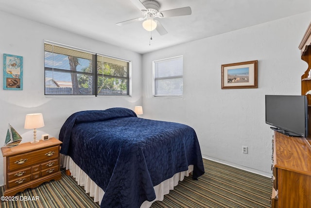 1 Beechwood Dr, Ormond Beach, FL 32176 - carpeted bedroom with ceiling fan and baseboards