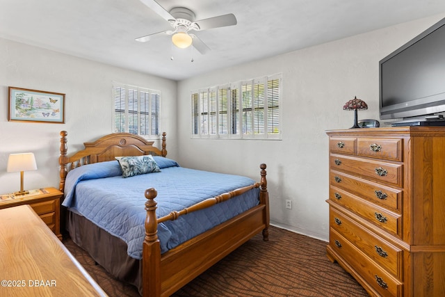 1 Beechwood Dr, Ormond Beach, FL 32176 - bedroom featuring multiple windows, ceiling fan, and dark carpet