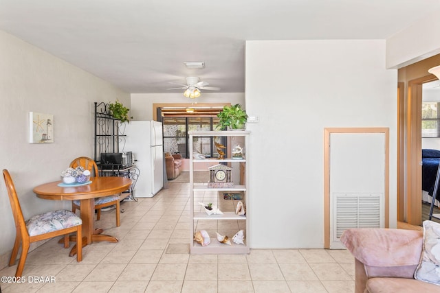 1 Beechwood Dr, Ormond Beach, FL 32176 - dining space featuring light tile patterned floors and ceiling fan