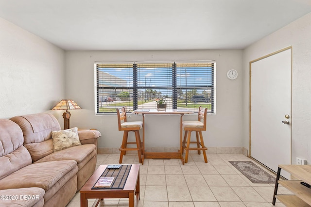 1 Beechwood Dr, Ormond Beach, FL 32176 - living area with light tile patterned floors and baseboards