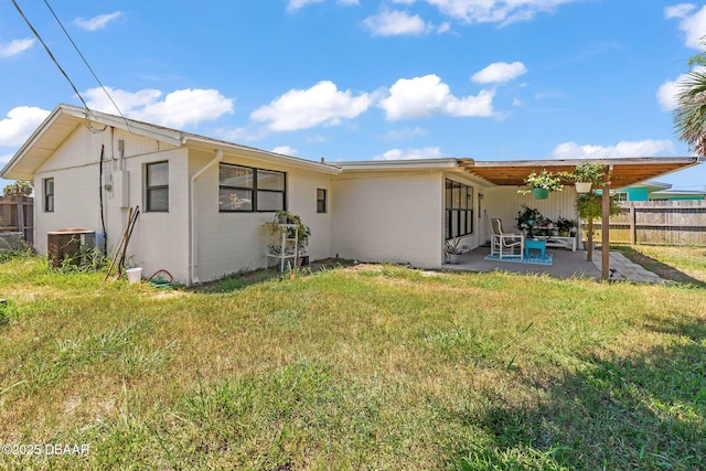 1 Beechwood Dr, Ormond Beach, FL 32176 - back of property featuring a patio area