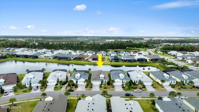 drone / aerial view featuring a water view