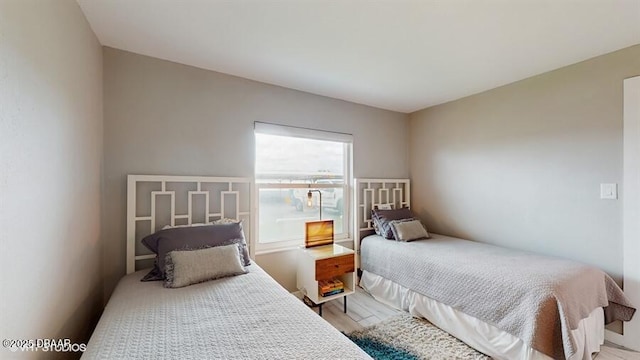 3170 Ocean Shore Blvd Unit 105, Ormond Beach, FL 32176 - bedroom featuring light wood-style flooring