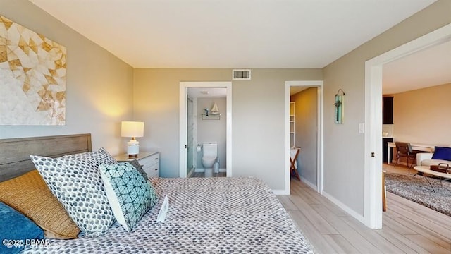 3170 Ocean Shore Blvd Unit 105, Ormond Beach, FL 32176 - bedroom featuring light wood finished floors and baseboards