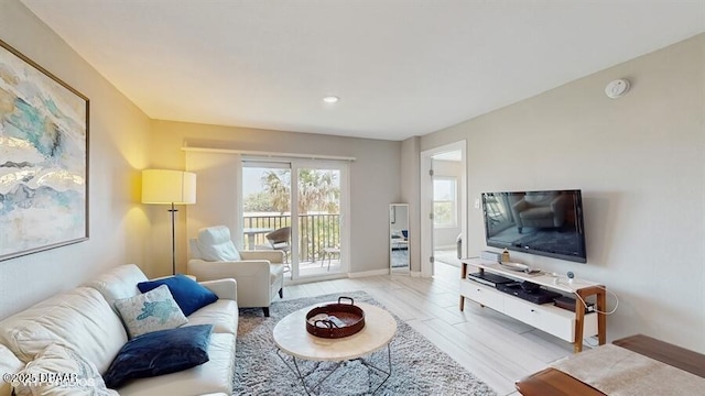 3170 Ocean Shore Blvd Unit 105, Ormond Beach, FL 32176 - living room featuring recessed lighting