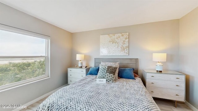 3170 Ocean Shore Blvd Unit 105, Ormond Beach, FL 32176 - bedroom with baseboards