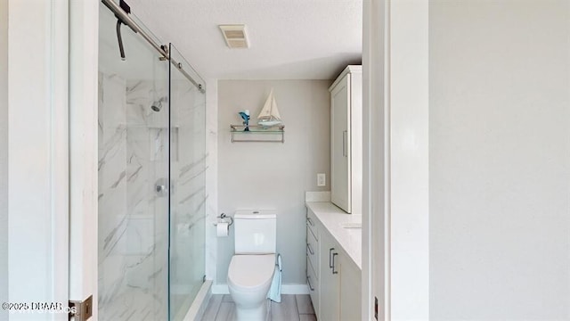 3170 Ocean Shore Blvd Unit 105, Ormond Beach, FL 32176 - bathroom featuring a marble finish shower and vanity