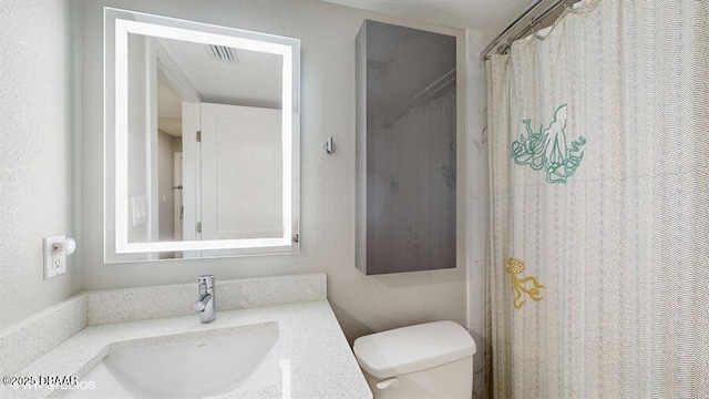 3170 Ocean Shore Blvd Unit 105, Ormond Beach, FL 32176 - full bath with vanity and toilet