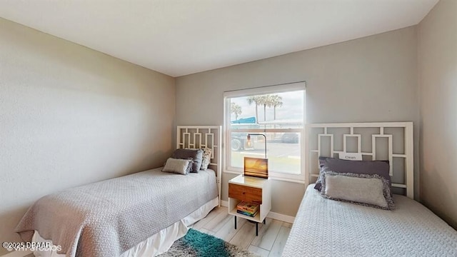 3170 Ocean Shore Blvd Unit 105, Ormond Beach, FL 32176 - bedroom featuring light wood finished floors